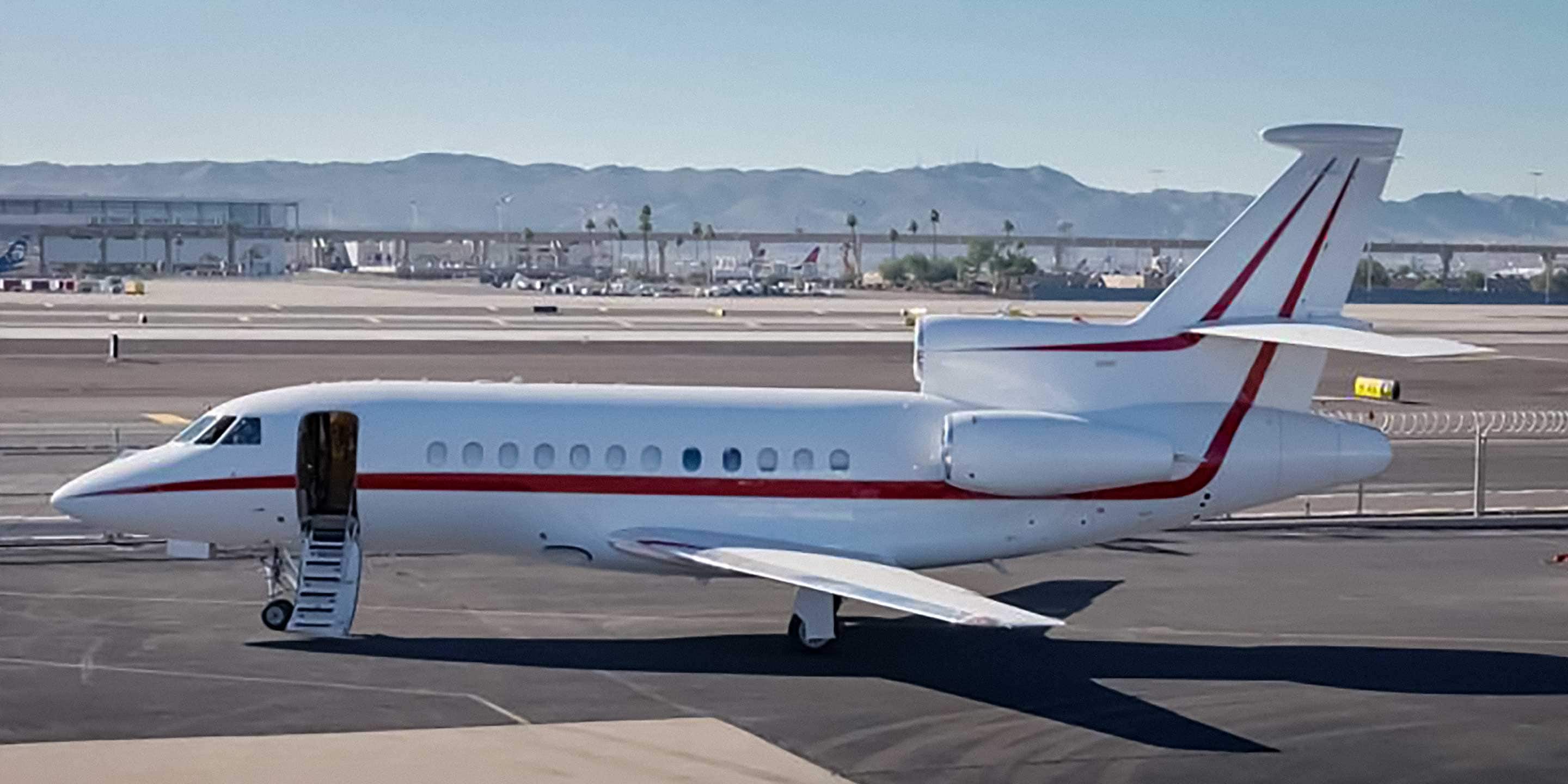Dassault Falcon 900 aircraft seen from the side on the tarmac 